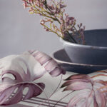 Still,Life,Gray,Vintage,Bowls,With,Pink,Flowers,And,Woolen